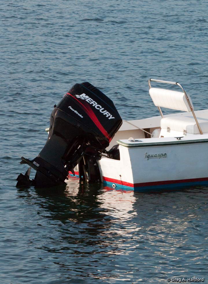 The 19 foot AquaSport motorboat rental in Manset